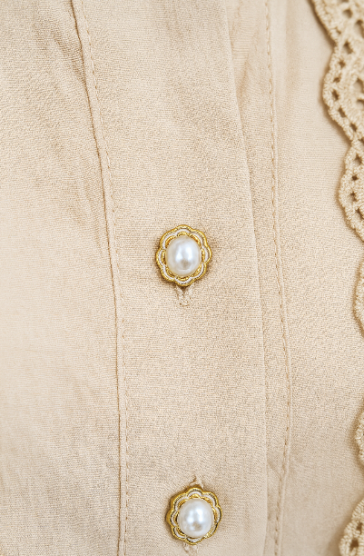 Аёллар учун тайёр кўйлак модели Тугмаси