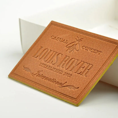 Шахсийлаштирилган логотип кийим-кечак тери ямоғи Кийим учун махсус бўрттирма жинсилар тери патч ёрлиғи