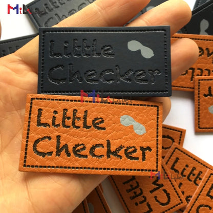 Махсус тери ямоқлари Дебоссед ва ипак экранли босма маркали чарм ямалар Жинслар чарм ёрлиқли дазмол.