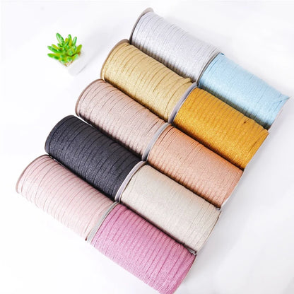 Экологик тоза 2мм 3мм 4мм Стокдаги Олтин кумуш тўрли металл эластик тасма полестер ва кийим учун каучукдан ясалган тўқув шнури