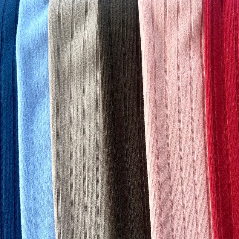 Янги дизайн — 93% полиэстер ва 7% спандексдан тўқилган 8×3 резинка трикотаж мати. Қизлар учун футболка, ички кийим, кўйлак, пижама ва тунги кийимлар тайёрлашга мос, чўзиладиган ва қулай материал