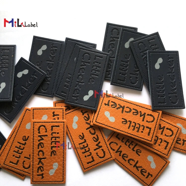 Махсус тери ямоқлари Дебоссед ва ипак экранли босма маркали чарм ямалар Жинслар чарм ёрлиқли дазмол.