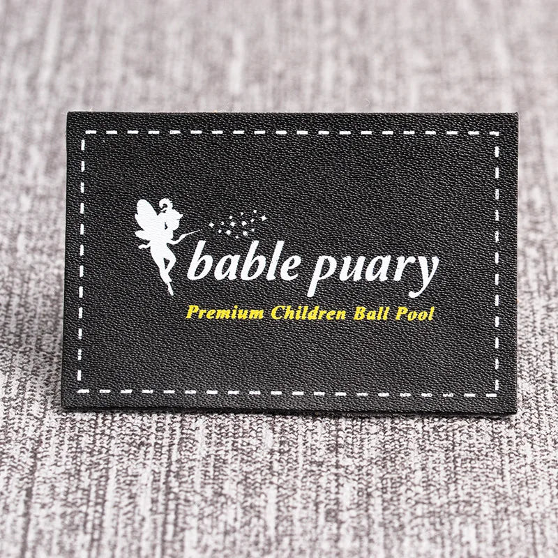 Юқори сифатли махсус логотип кабартмалı ПУ ёрлиғи ямоқлари ёрлиғи Тери ямоқ кийим аксессуарлари Жинси шимлар учун тери ёрлиғи