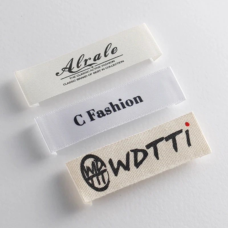 Ўз-ўзидан ёпиштирувчи  тўқув ёрлиқлари логотиплари Кийим учун босилган ёрлиқлар Пахта мослаштирилган кийим ёрлиқлари