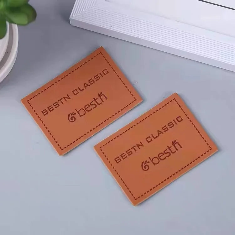 Махсус чарм патч улгуржи фабрикаси бўрттирма логотипи иссиқлик пресси жинси шимлар юк машинаси тери ёрлиқлари