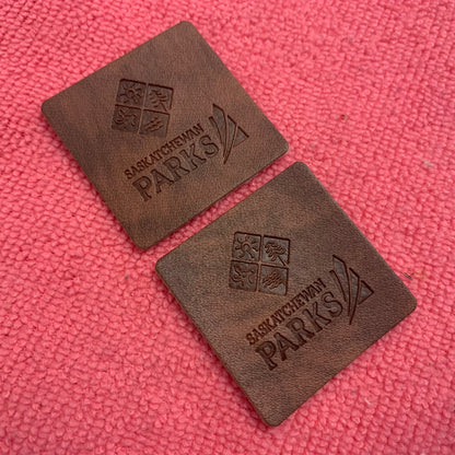 Қўлда ишланган синтетик ПУ сунъий тери патч, махсус жинси шимлар маркаси бўрттирма чарм ёрлиғи