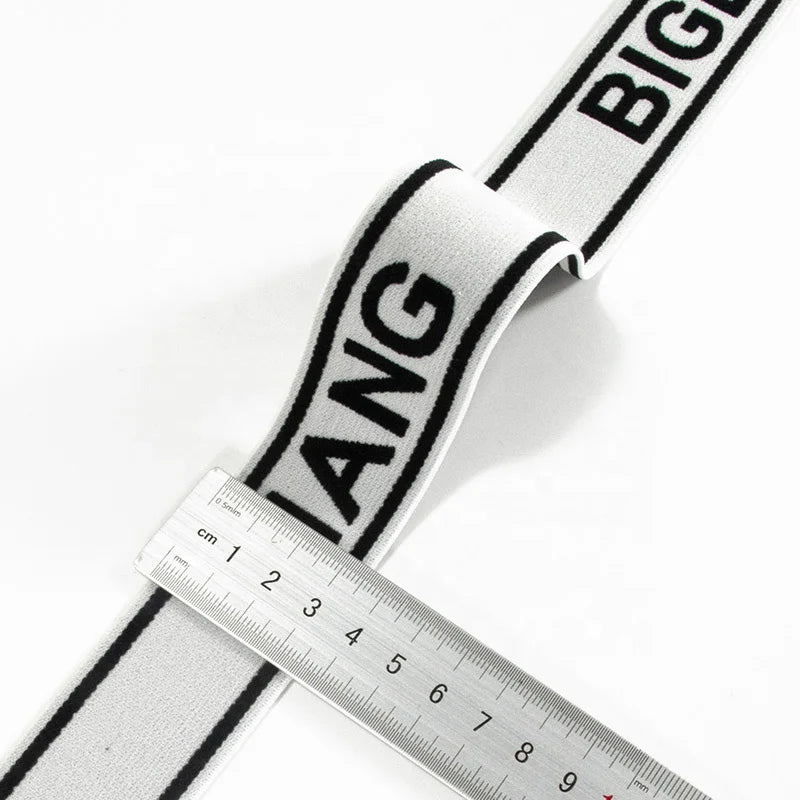 Махсус жаккард брендлари логотипи Юмшоқ кенг эластик тасмалар Трикотажли тўқилган эластик тасмали сутен