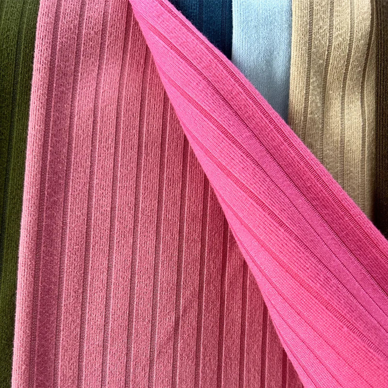 Янги дизайн — 93% полиэстер ва 7% спандексдан тўқилган 8×3 резинка трикотаж мати. Қизлар учун футболка, ички кийим, кўйлак, пижама ва тунги кийимлар тайёрлашга мос, чўзиладиган ва қулай материал