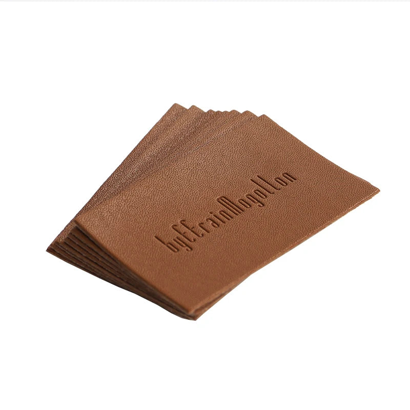 Шляпалар учун махсус жинси тери патч Блинд Эмбосс логотипи ПУ чарм патч