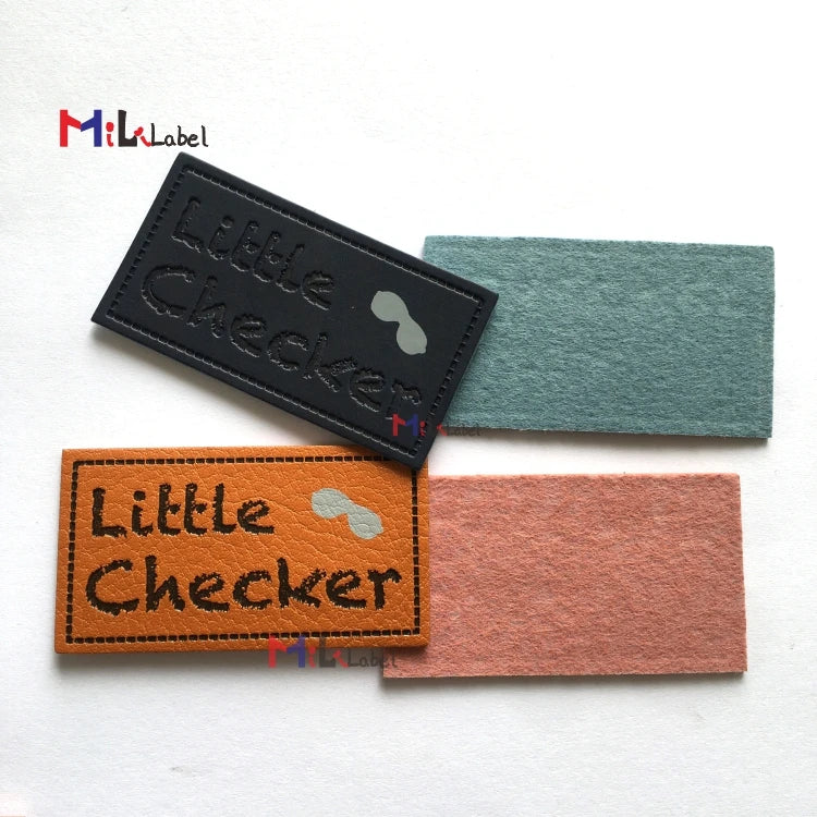 Махсус тери ямоқлари Дебоссед ва ипак экранли босма маркали чарм ямалар Жинслар чарм ёрлиқли дазмол.