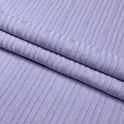 210 г/м² зичликдаги органик 40s рибана жерси мата — 97% пахта ва 3% спандексдан ишланган, юмшоқ, нафас оладиган ва чўзиладиган материал. Футболка ва пижама каби енгил кийимлар учун идеал танлов