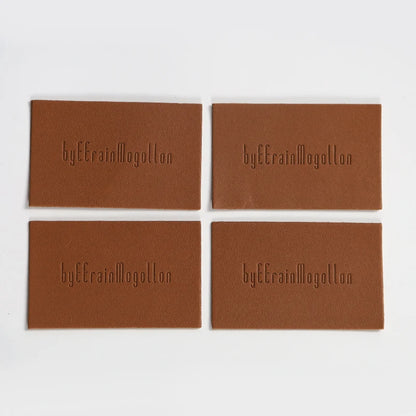 Шляпалар учун махсус жинси тери патч Блинд Эмбосс логотипи ПУ чарм патч