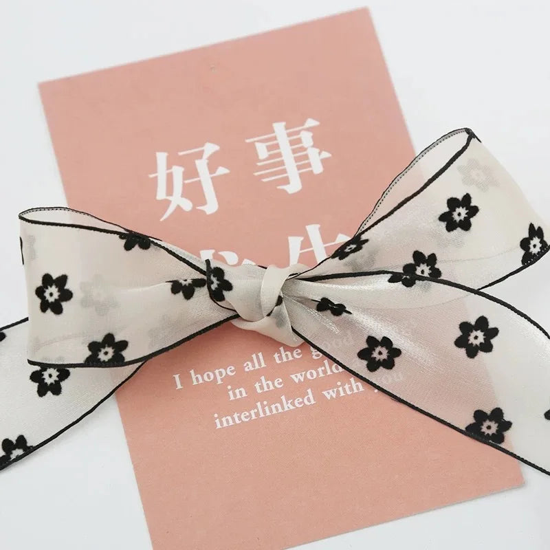 Корея услубидаги 100% полиэстердан тўқилган лента, эни 3,8 см, замонавий босма нақш билан