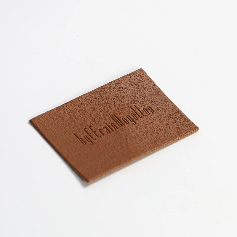 Шляпалар учун махсус жинси тери патч Блинд Эмбосс логотипи ПУ чарм патч