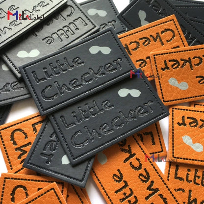 Махсус тери ямоқлари Дебоссед ва ипак экранли босма маркали чарм ямалар Жинслар чарм ёрлиқли дазмол.