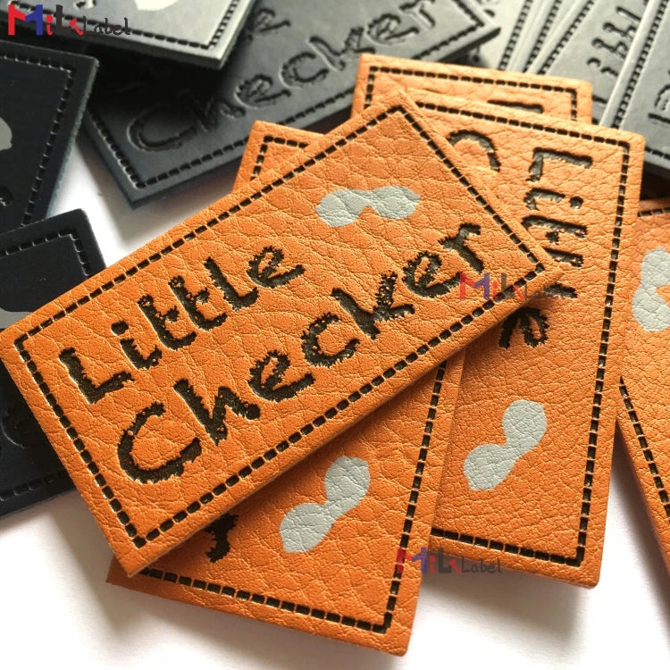 Махсус тери ямоқлари Дебоссед ва ипак экранли босма маркали чарм ямалар Жинслар чарм ёрлиқли дазмол.