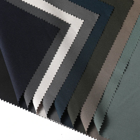 Улгуржи полиэстер терри нуқтали мато — кийим-кечак учун чўзиладиган спандексли мато, ғилдирак (рулон) кўринишида тўқилган текстиль