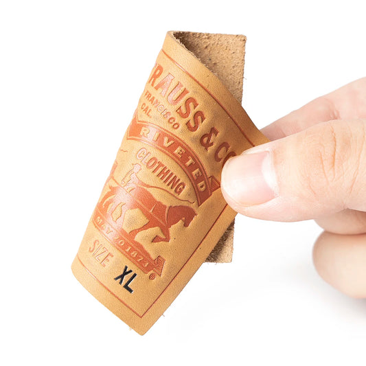 Жинслар учун шахсийлаштирилган бўрттирма тери патч улгуржи махсус чарм патч