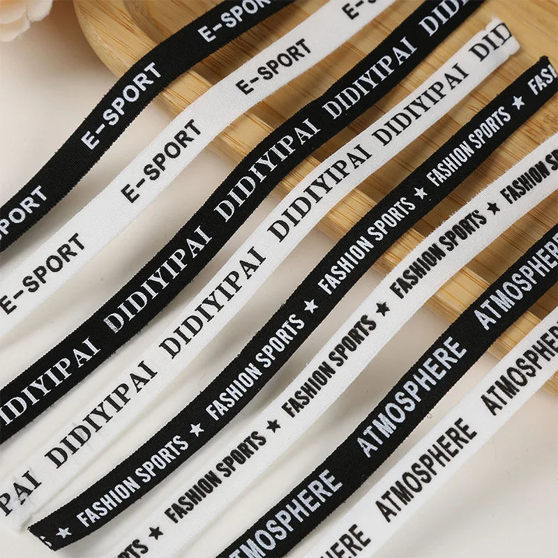 Кучли жаккардли логотипли тасмали нейлон белдаги қора эластик тасма созланиши ранги ва кенглиги билан