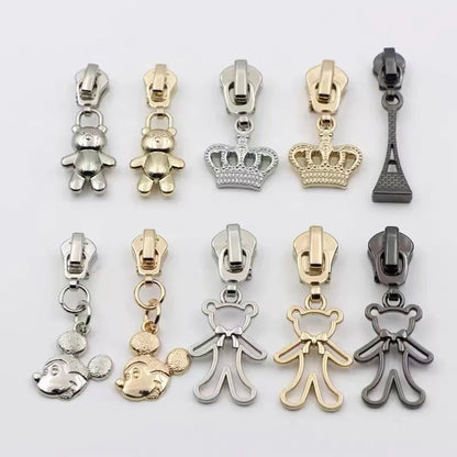 Ҳенгда фабрикаси мослаштирилган мултфилмли фермуарни тортиб олиш боши аксессуарлари Кийим учун металл слайдер Юқори сифатли қотишма фермуар мослаштирилган