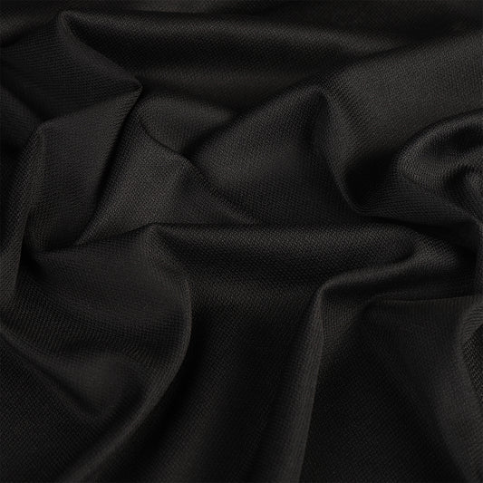 Дублерин KUBRO TEXTILE эластик, зичлиги 62 г/м², қора ранг, эни 150 см, қадоғи 1 дона (бунда "уп.1" 1 рулон ёки 1 қадоқни билдиради).